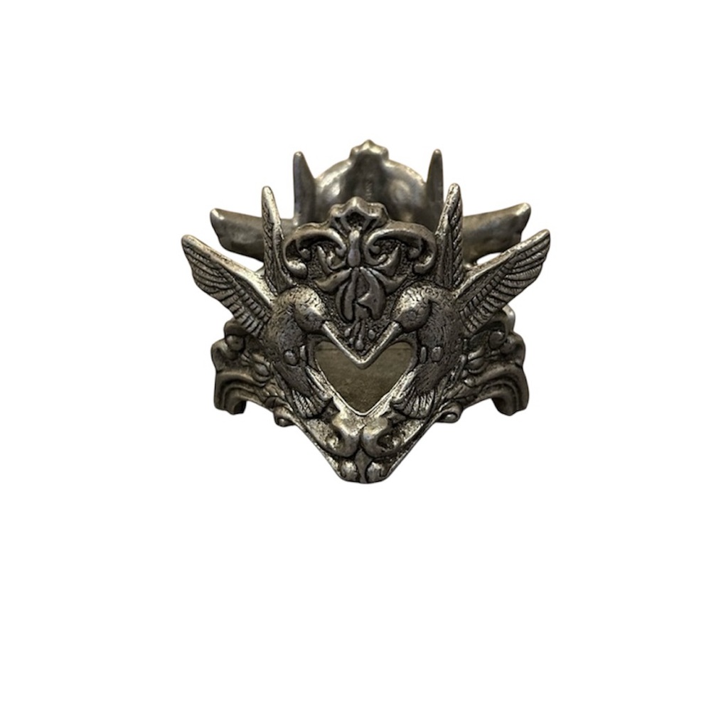 Pewter candle holder features hummingbirds and hearts